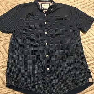 Blue and white short sleeve button up shirt